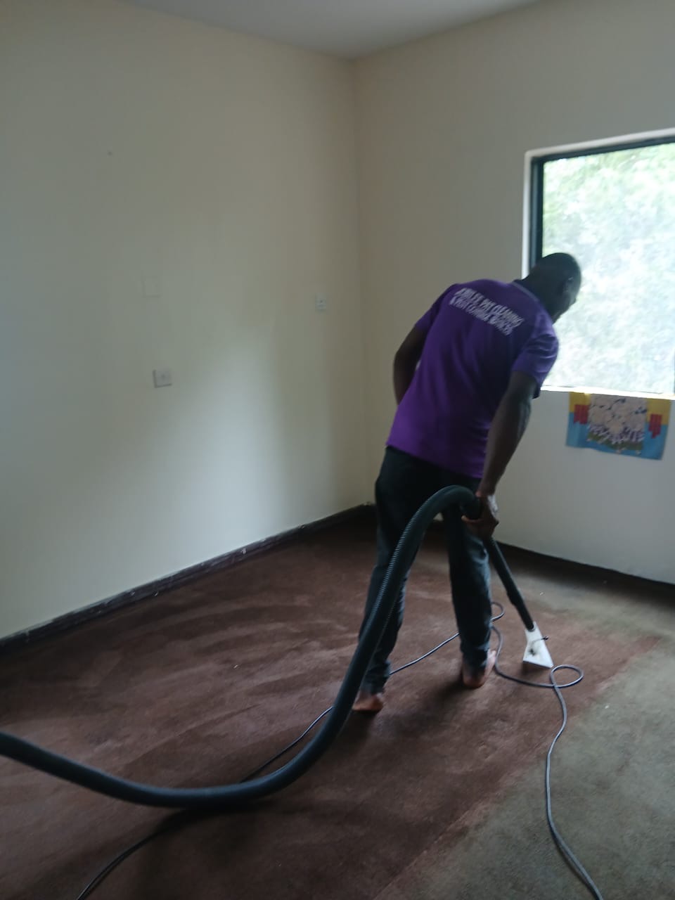 Hot-water carpet extraction in a Lagos apartment